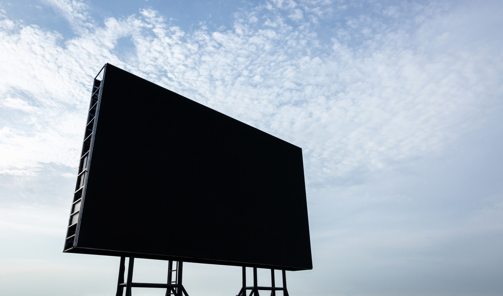 A Large LED Screen Panel with Blue Sky Background.